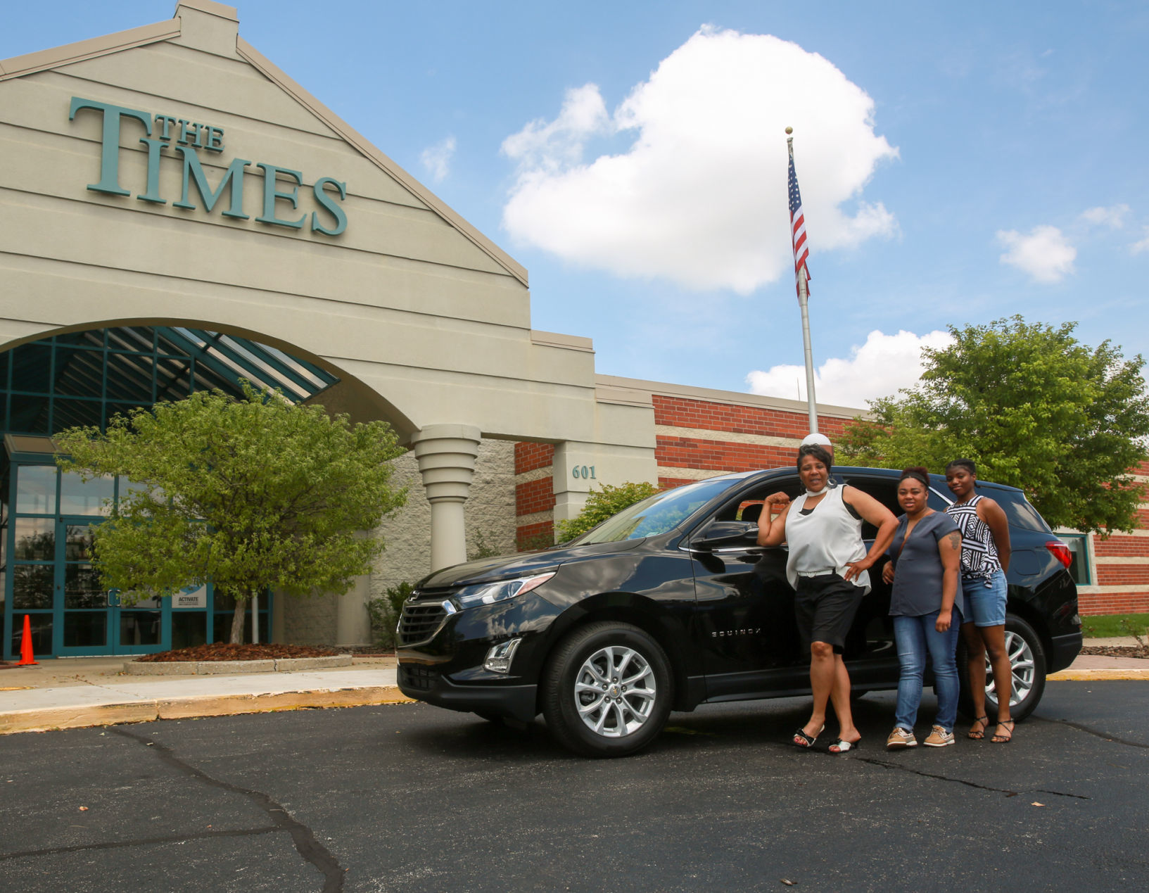 Presentation of new Chevy to Times/Chevy contest winner Lolita Whitehead